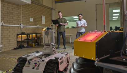 two people with equipment around