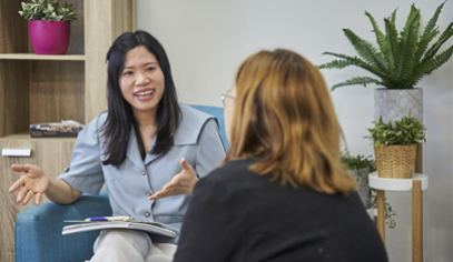 person speaking to another person