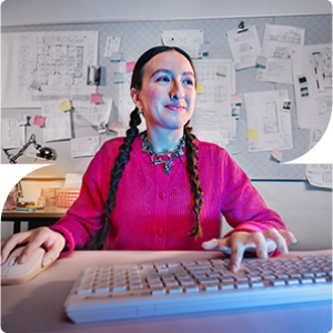 female draftsperson typing
