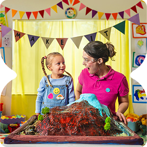 female child care worker with child in a colourful setting
